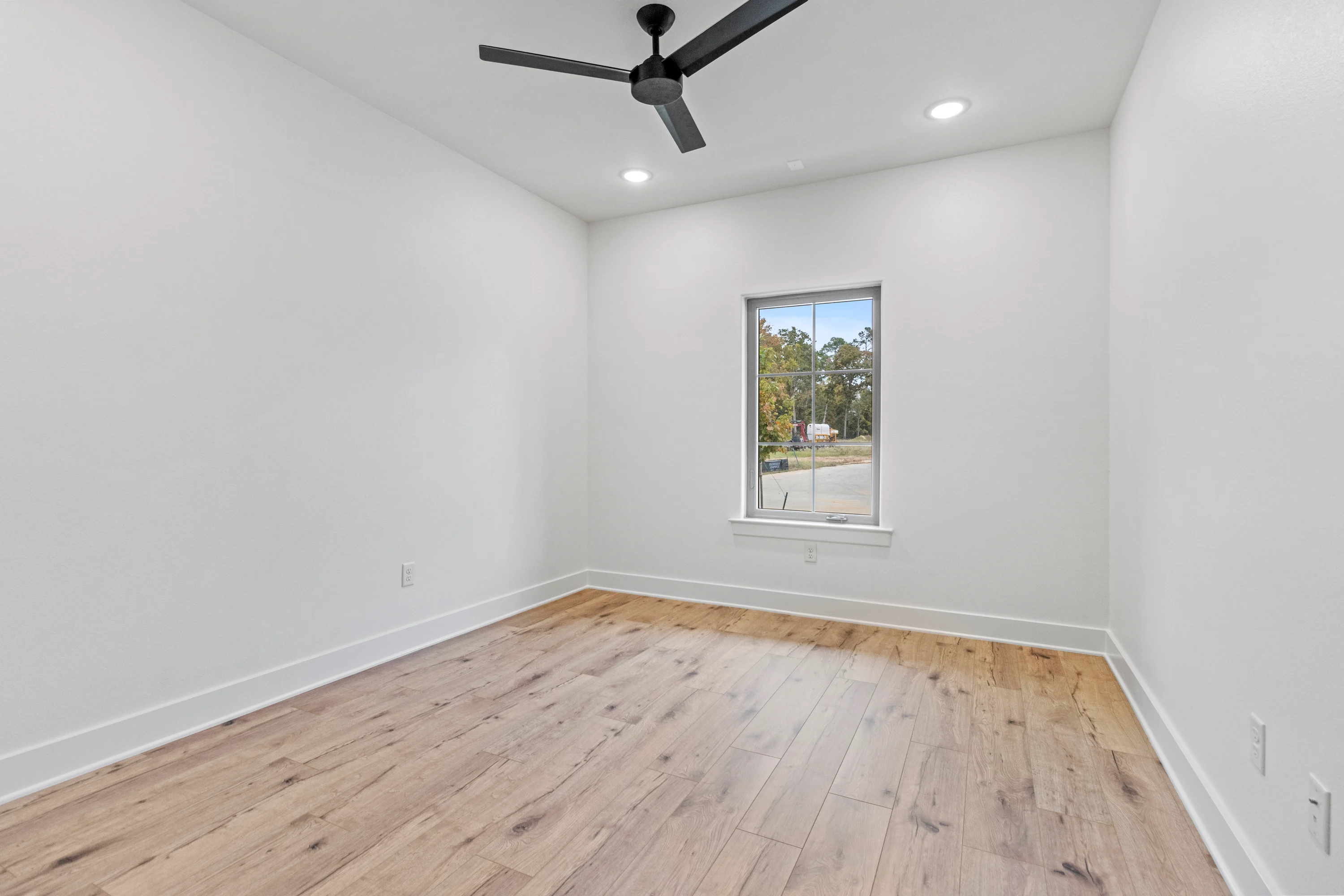 Second bathroom with contemporary fixtures inside the 6858 Lazy Vale Court duplex.