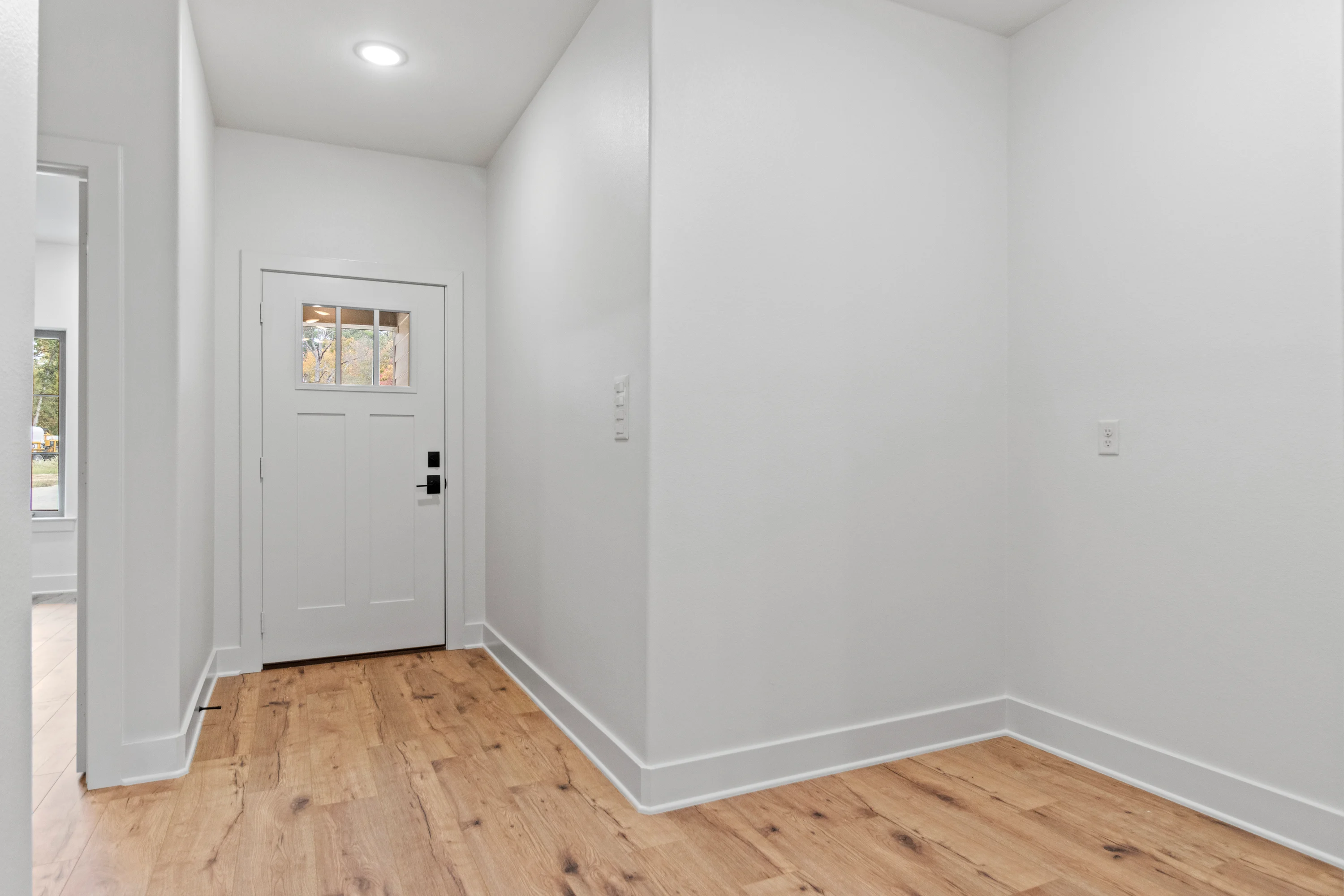 Primary bathroom with contemporary vanity and finishes inside a 6858 Lazy Vale residence.