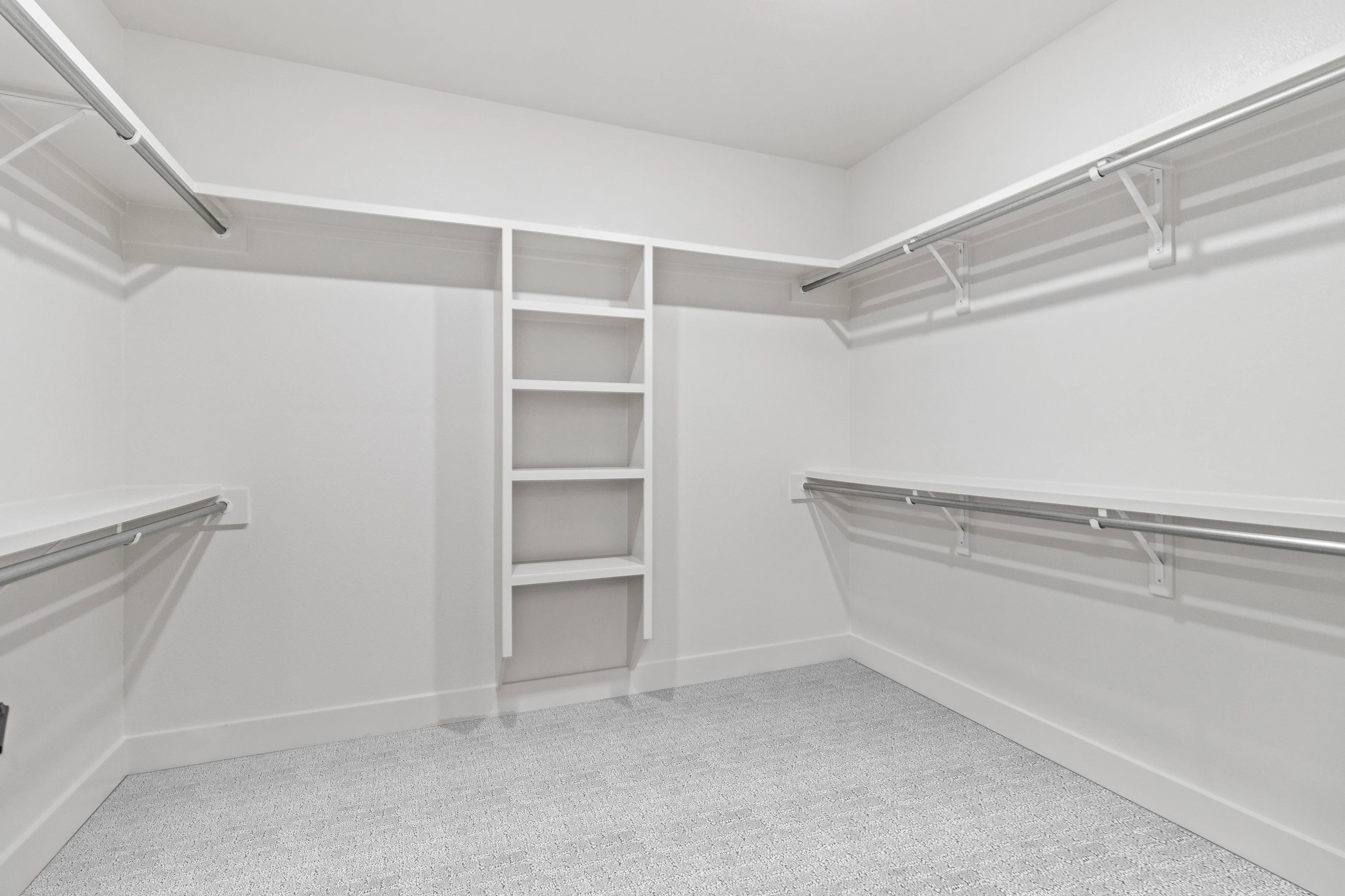Second bedroom with natural light inside a duplex residence at 6858 Lazy Vale Court.