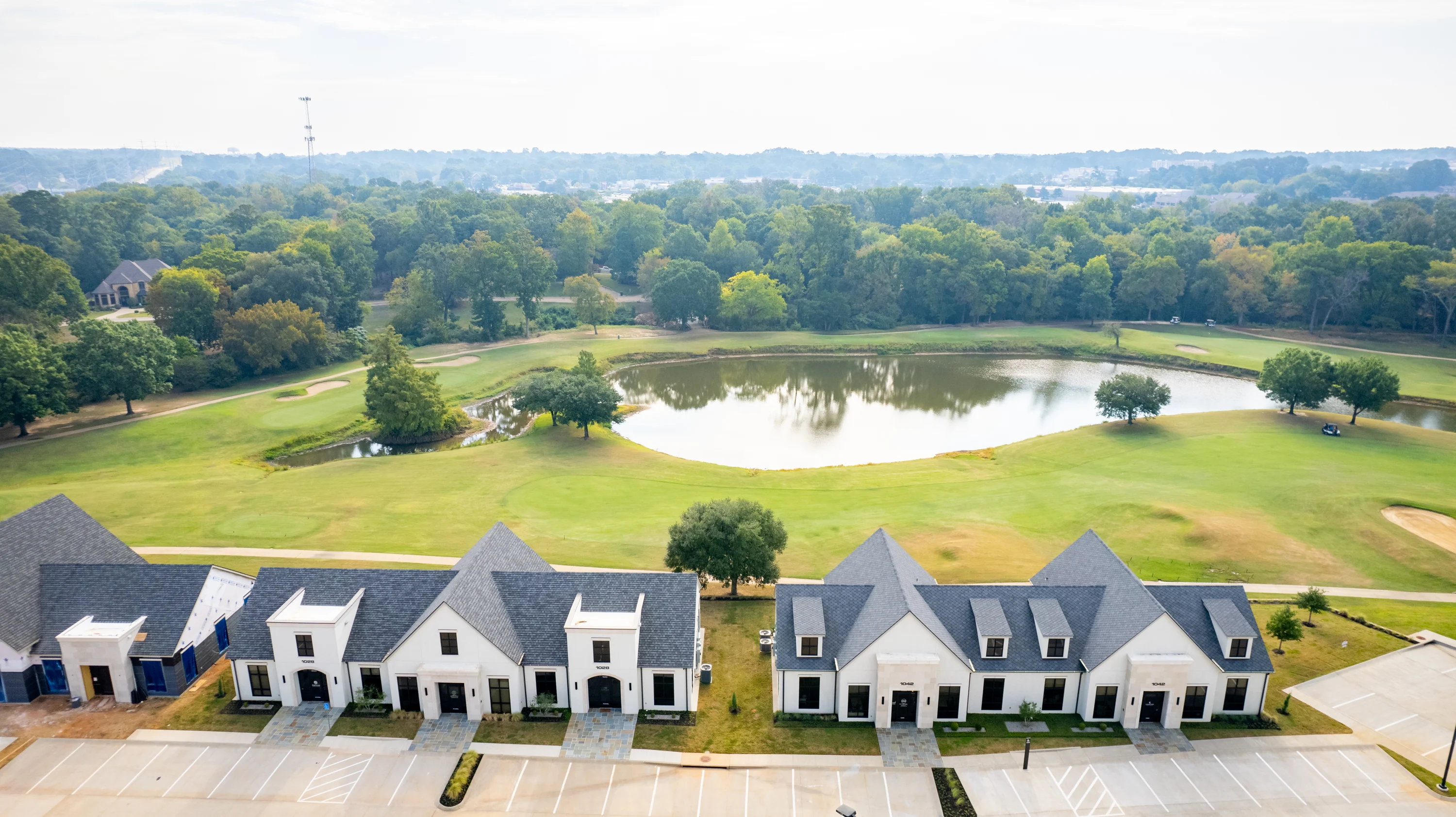Private office with 10-foot ceilings and vinyl plank flooring at Asher Park in South Tyler.