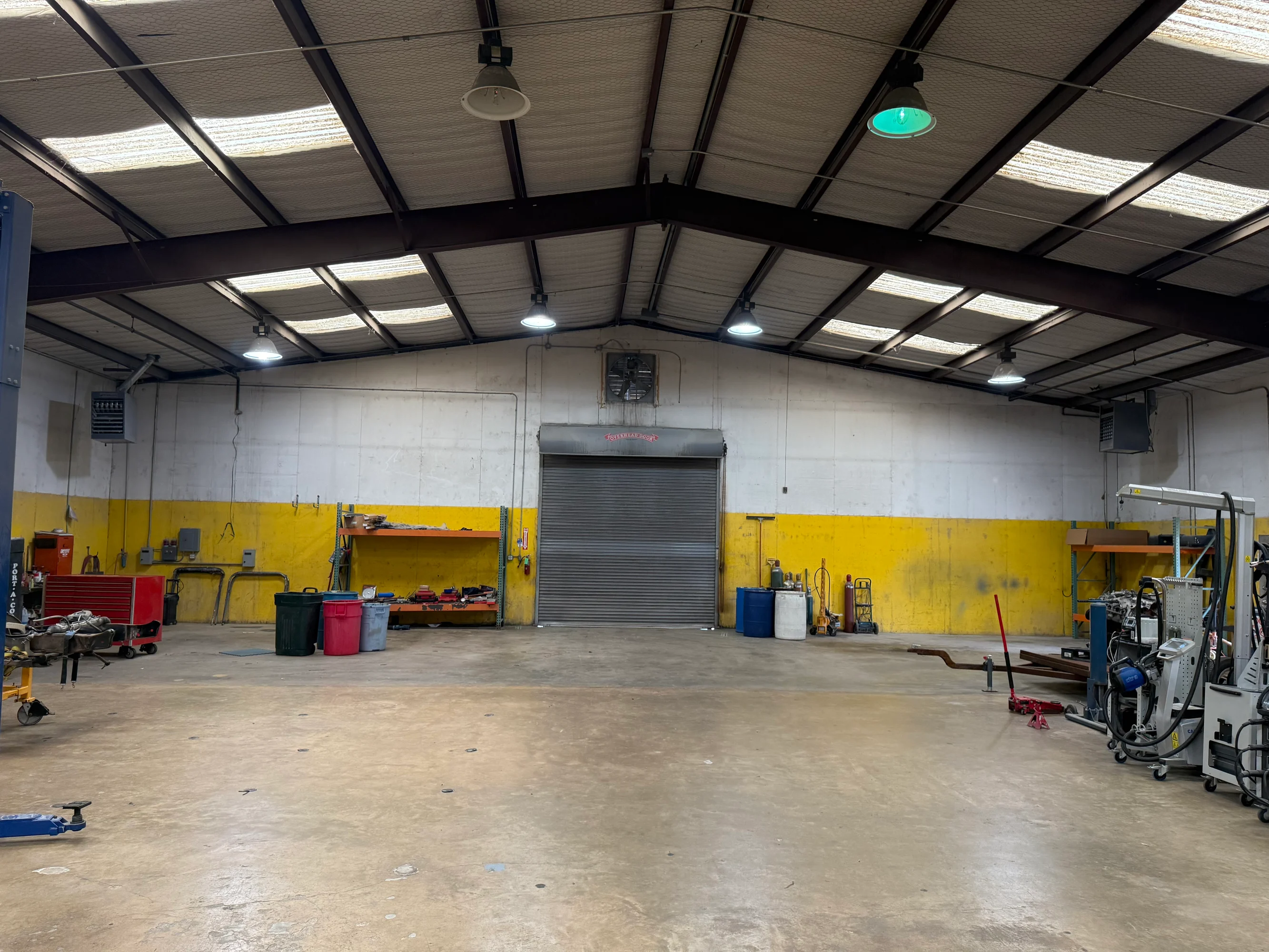 Warehouse interior with approximately 16-foot clear height inside one of the Candy Park buildings.
