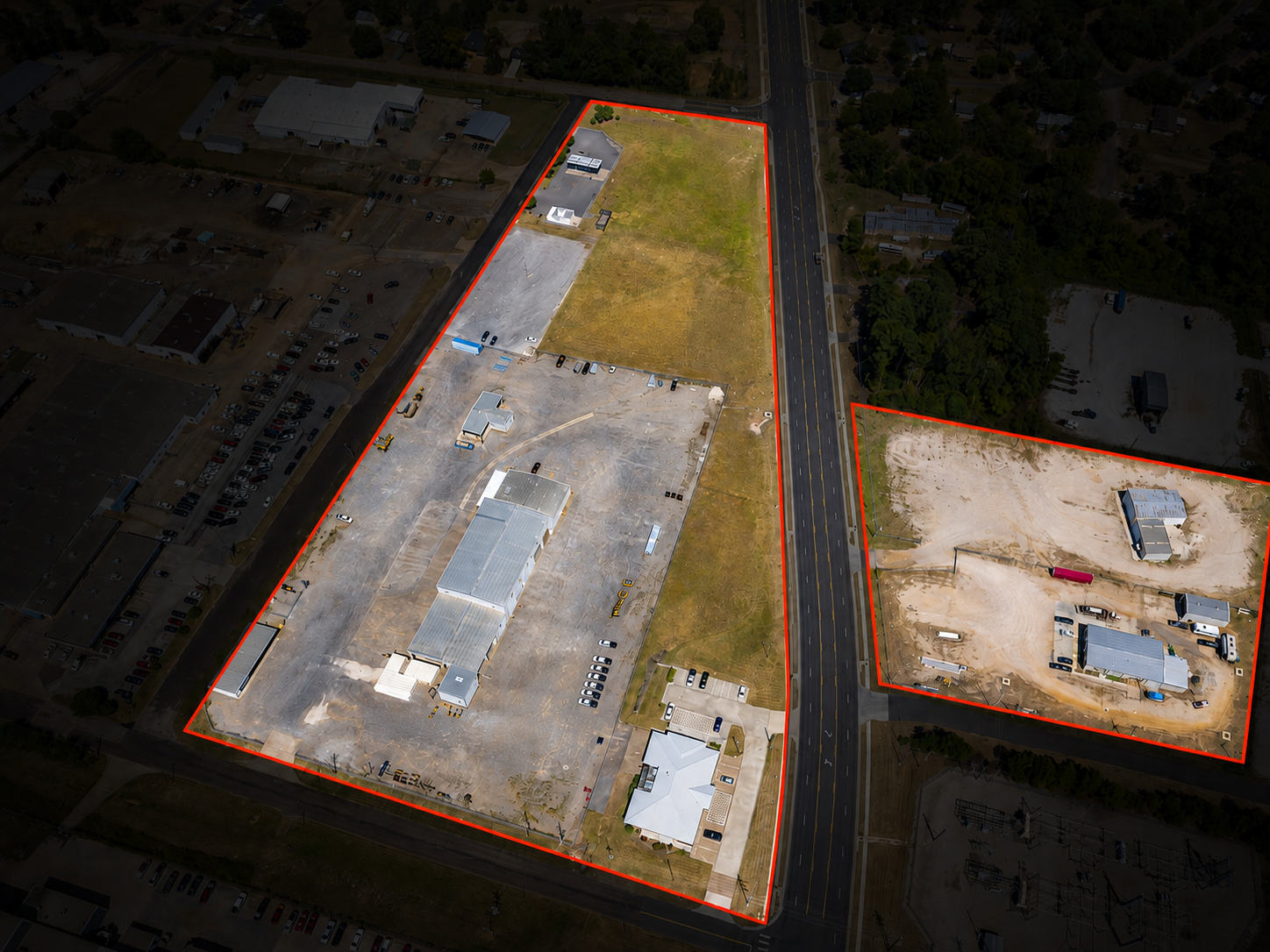 Aerial site map with property boundaries outlined in red showing the two portfolio parcels flanking the highway.