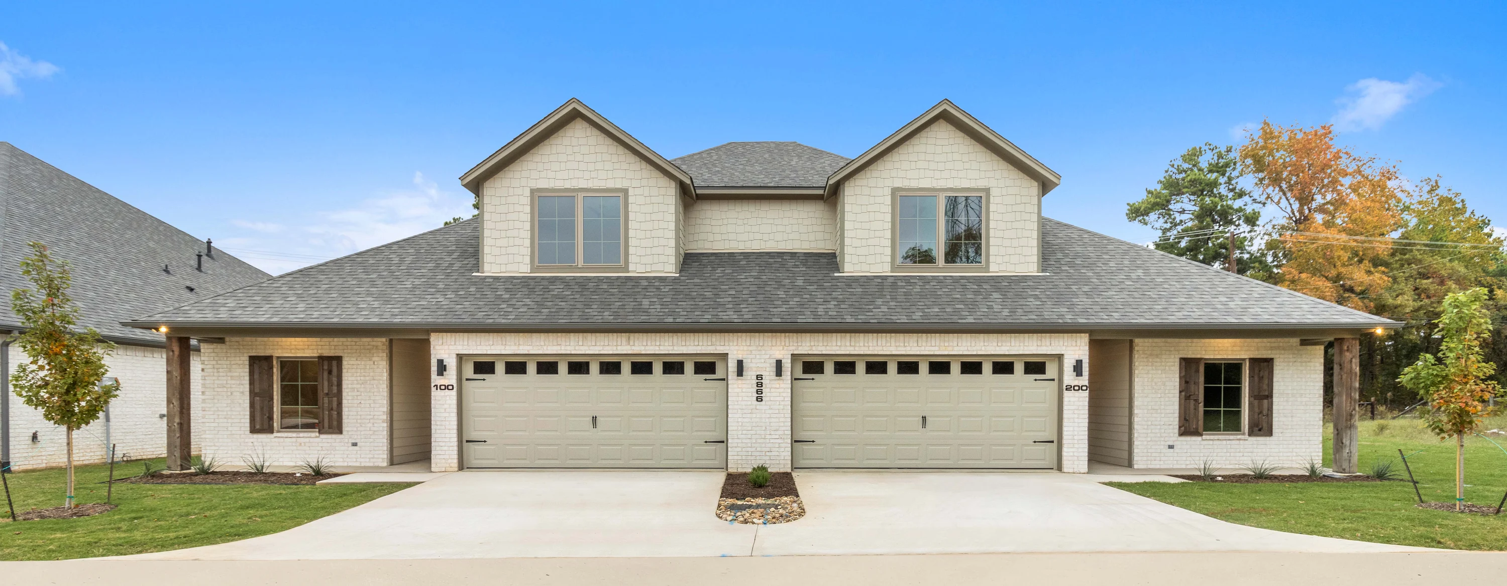 Aerial view of the four duplex buildings and internal driveways at Henshaw Creek in South Tyler.