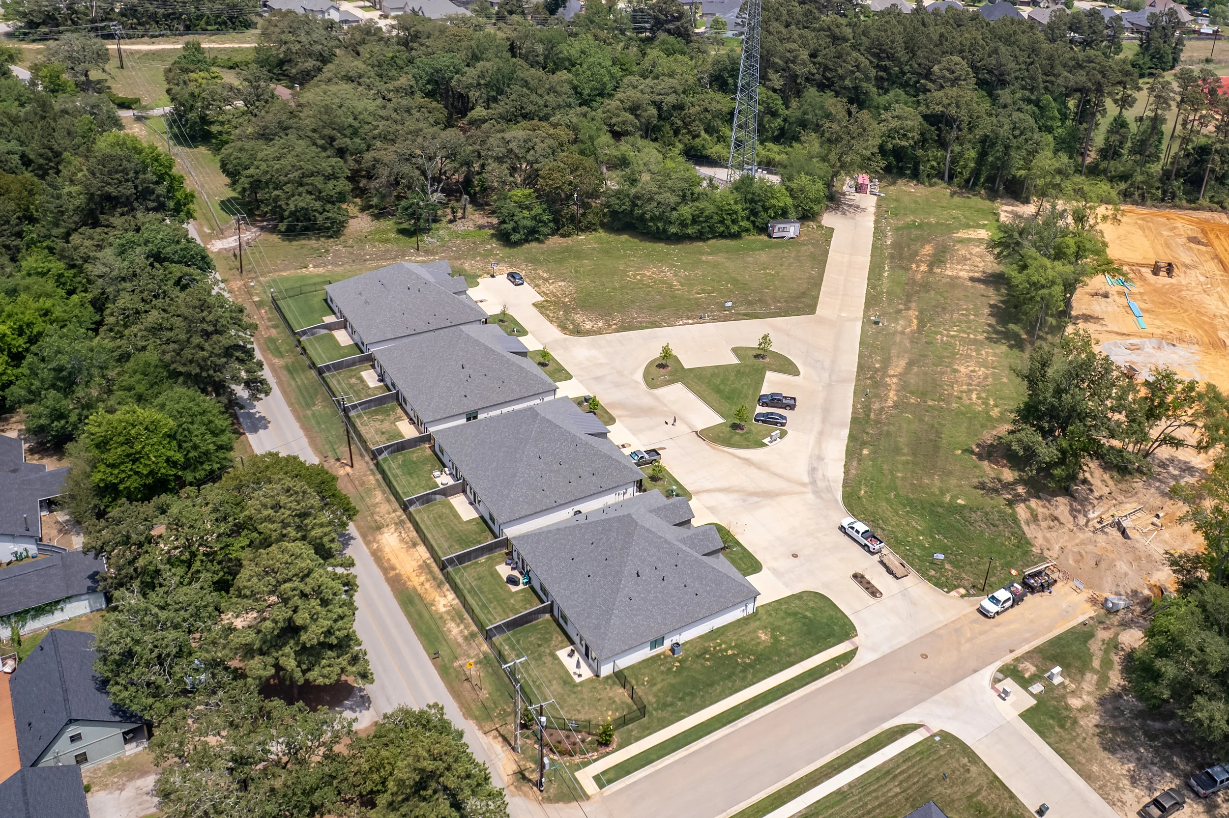 Wide aerial view of Henshaw Creek Duplex Community and the surrounding Lazy Vale Court neighborhood.