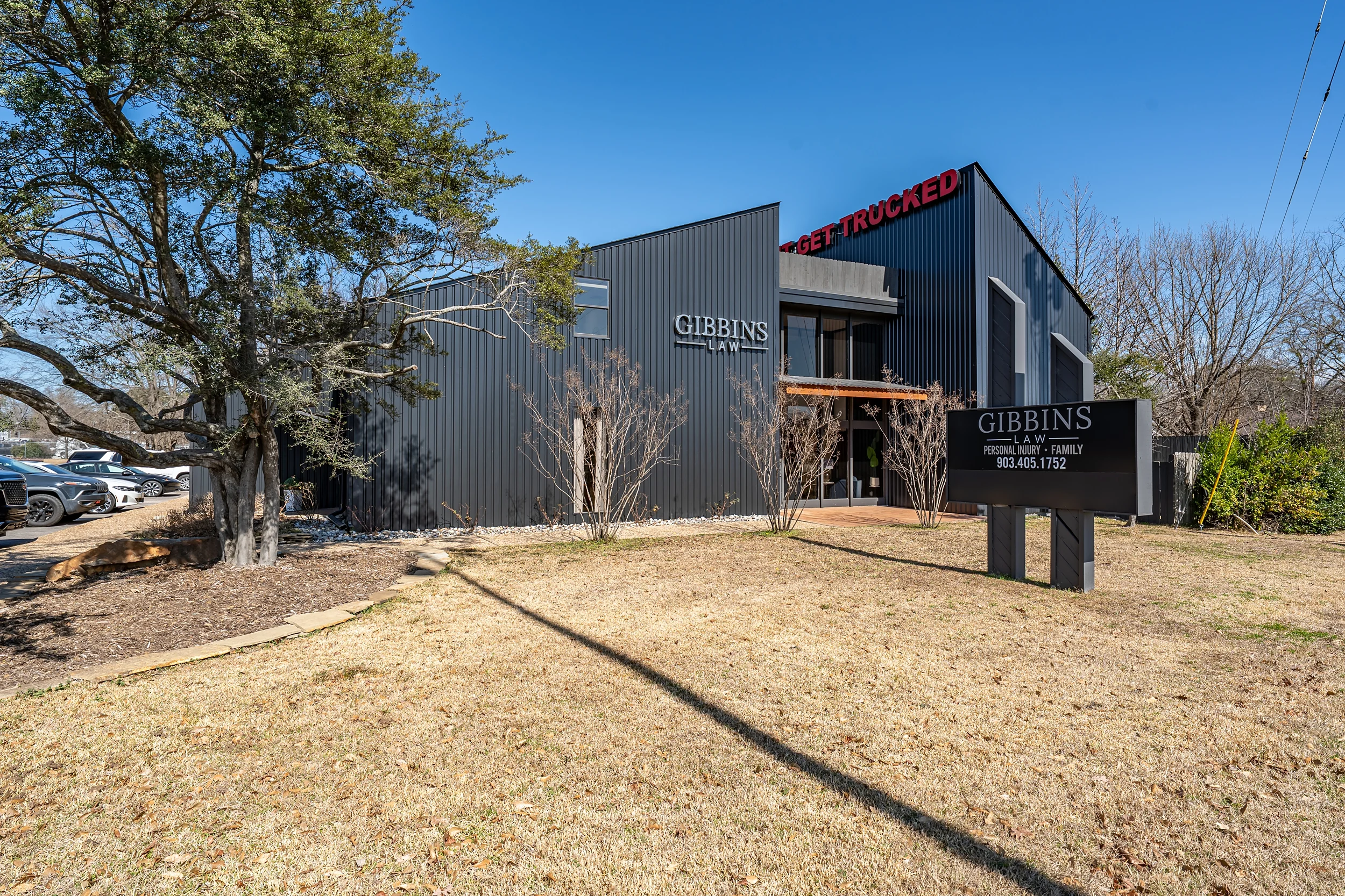 Aerial view showing both office buildings, on-site parking, and W. Southwest Loop 323 frontage in Tyler.