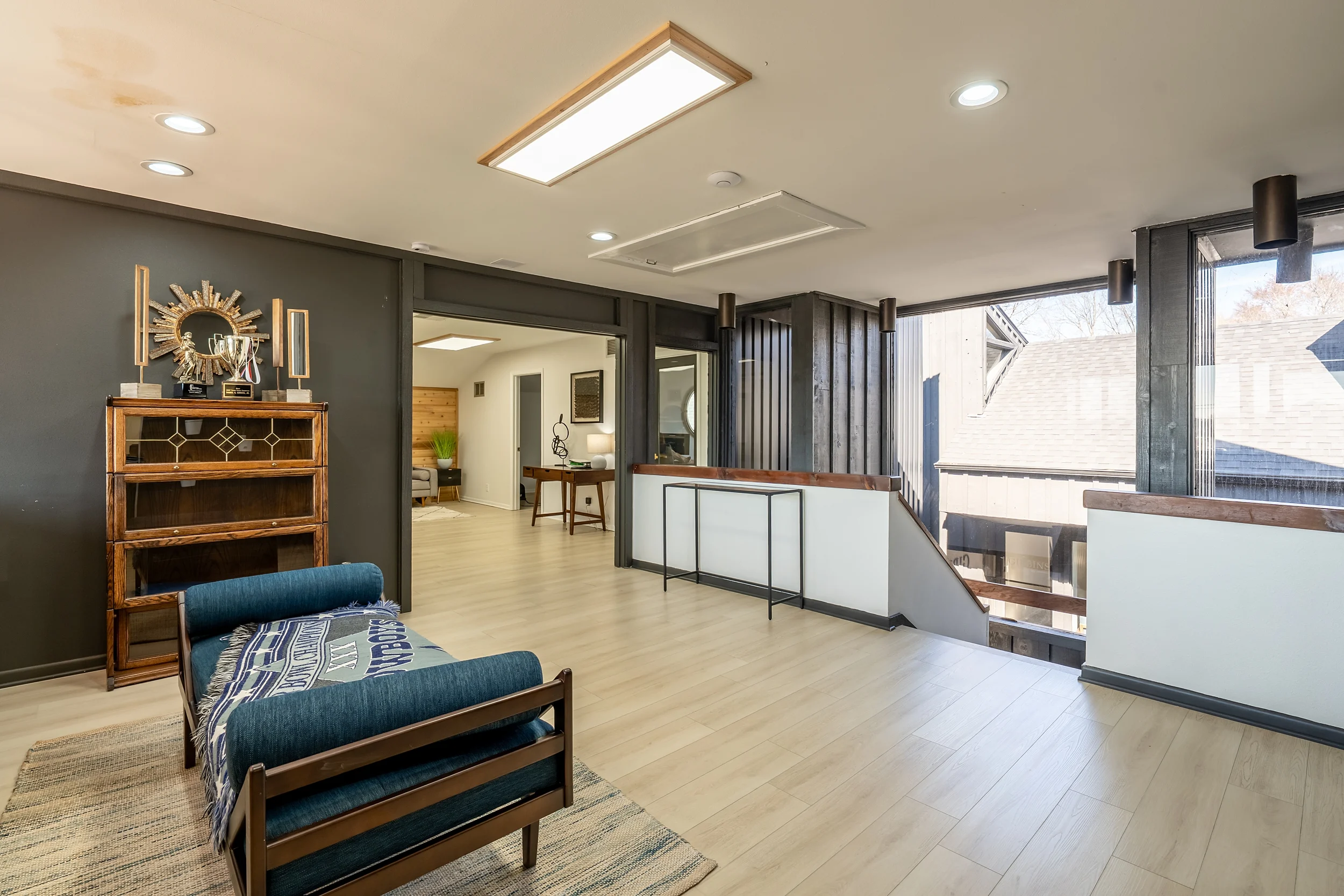Windowed private office showing natural light and updated interior finishes at the Loop 323 property.