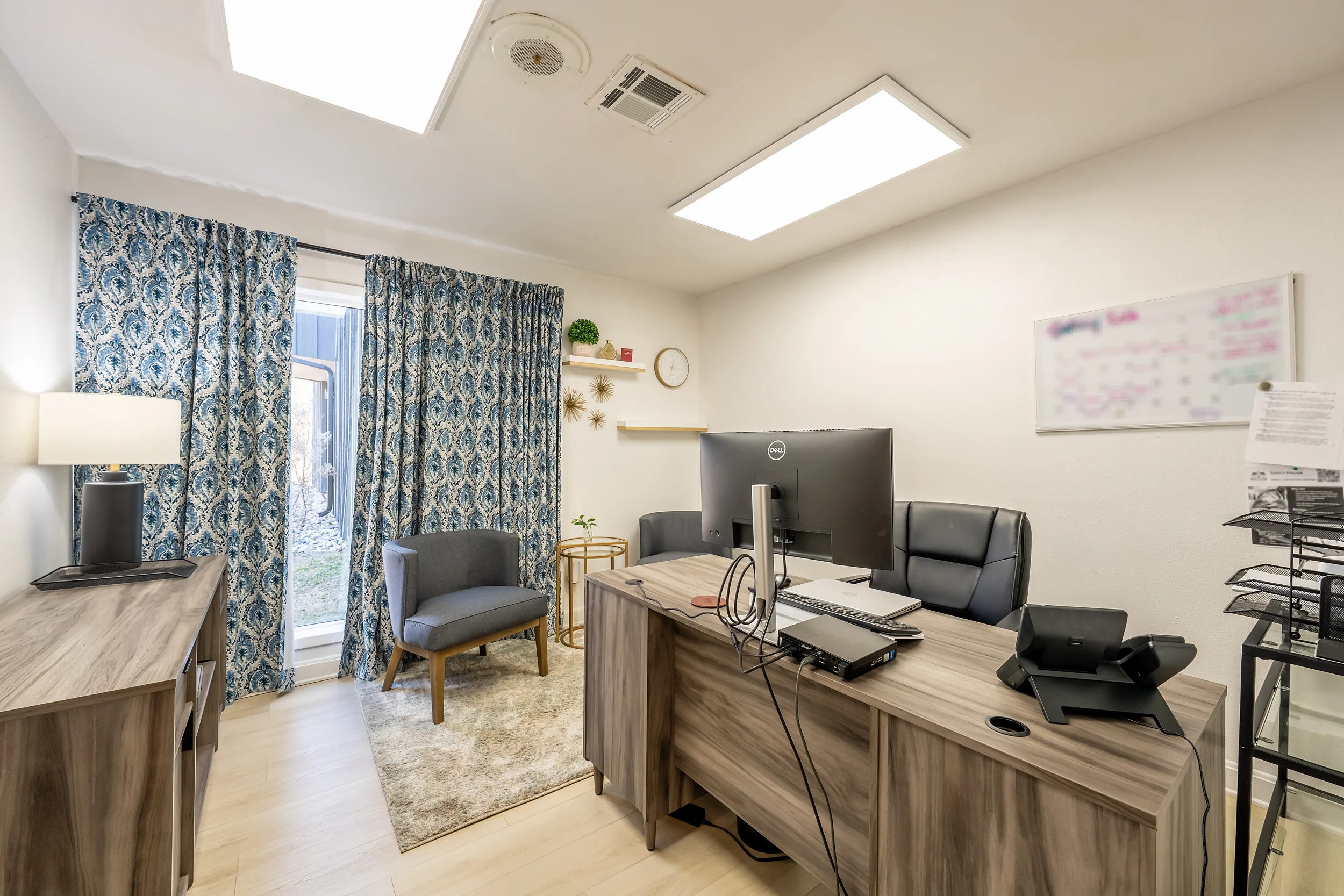 Additional private office with updated flooring and paint at the Loop 323 office property.