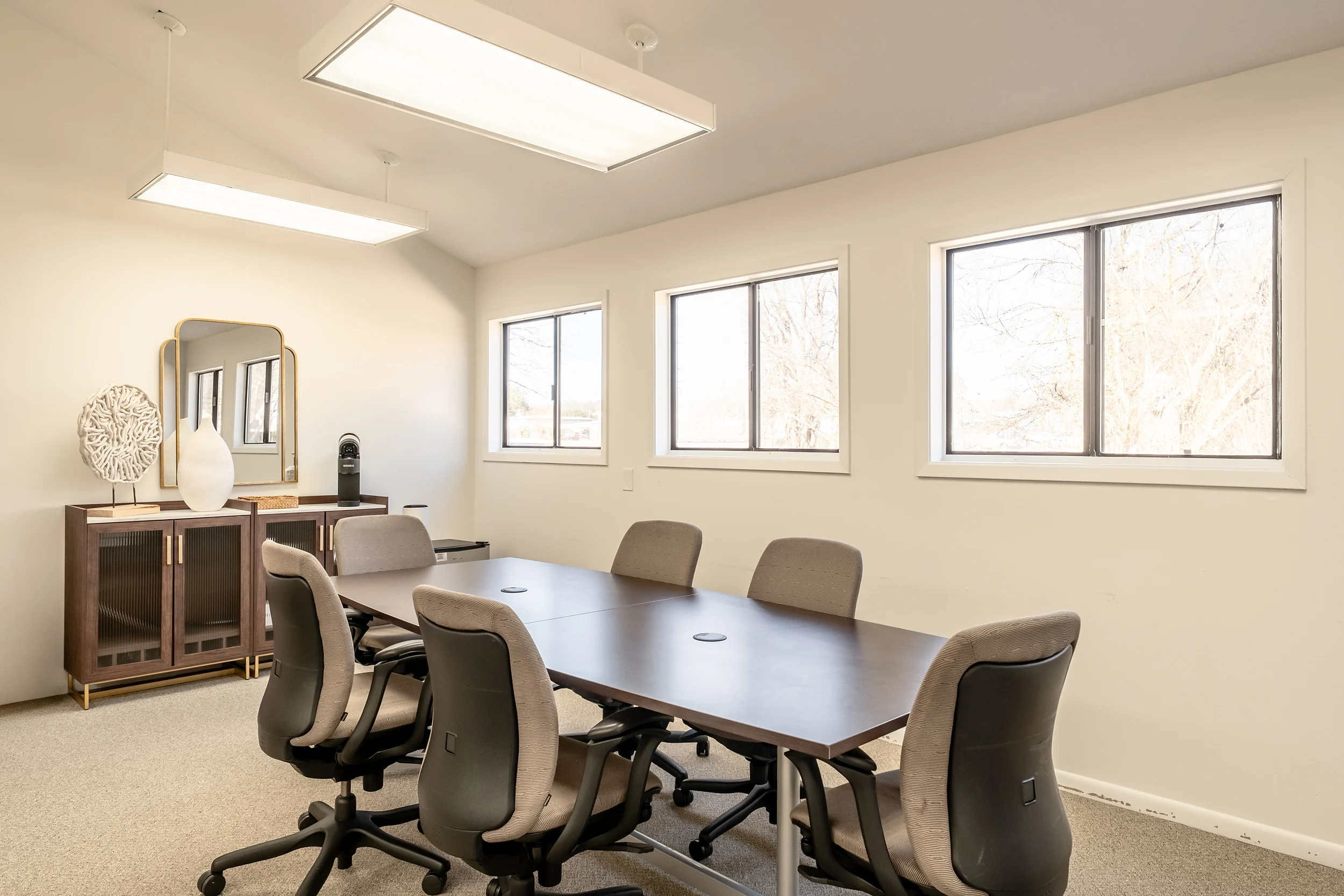 Kitchenette or employee break area inside the renovated professional office space.