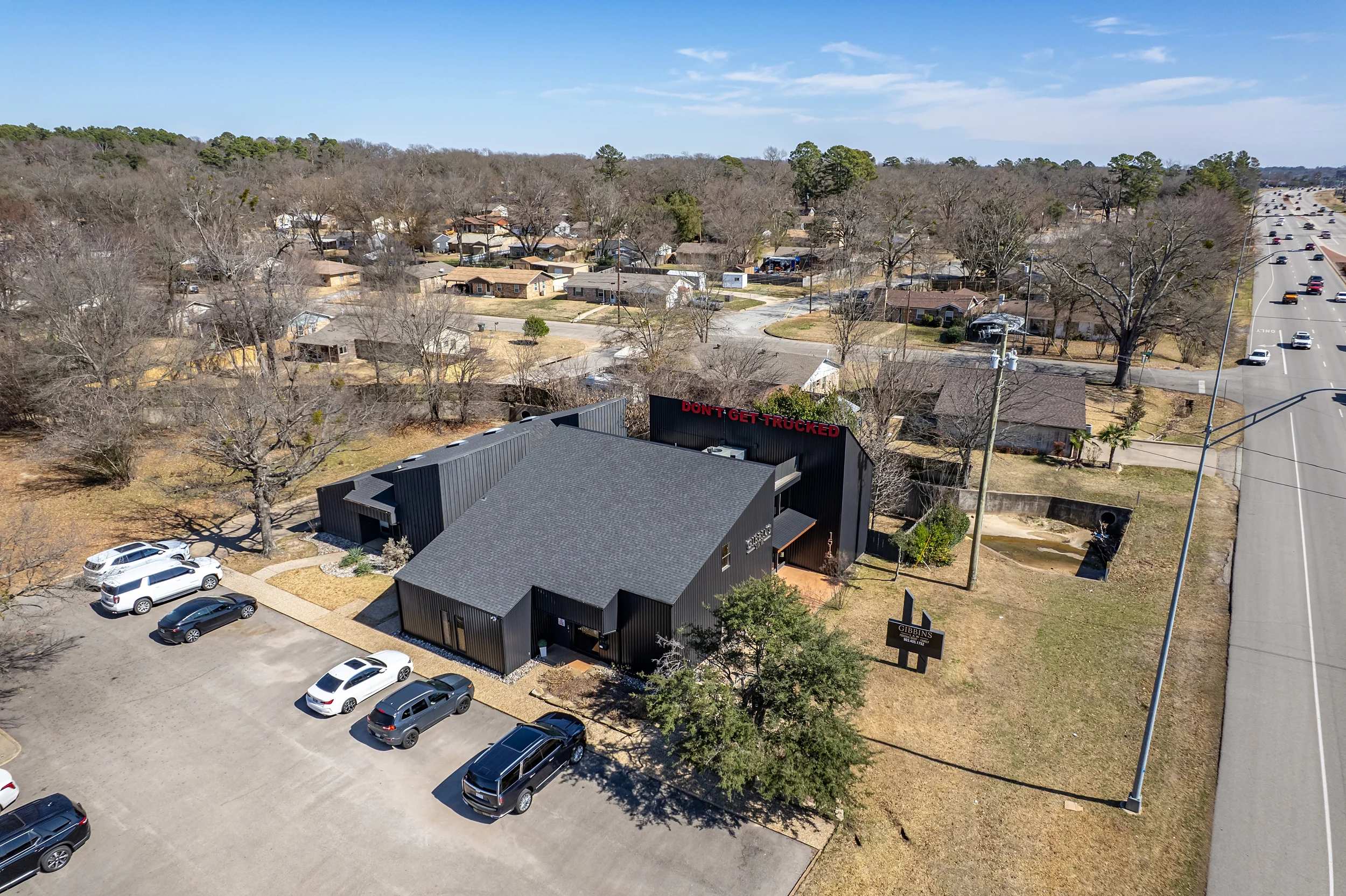 Exterior view of the renovated office buildings and parking along W. Southwest Loop 323 in Tyler.