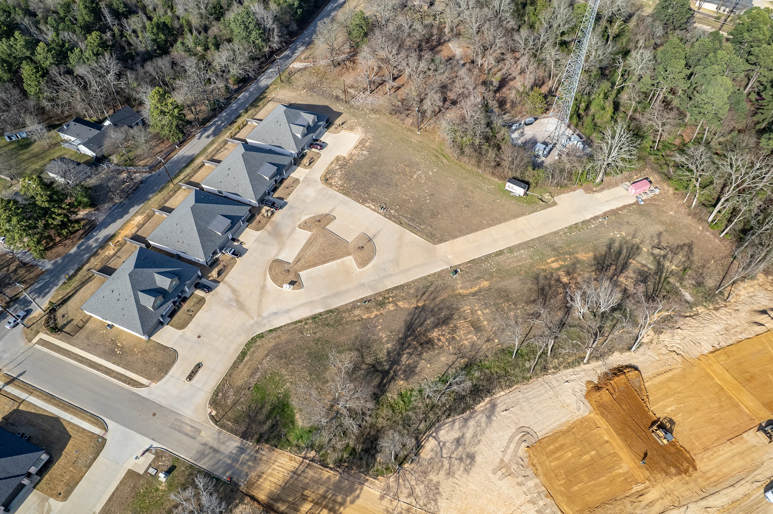 Aerial angle across the seven-lot package showing the scale of the contiguous South Tyler development site.