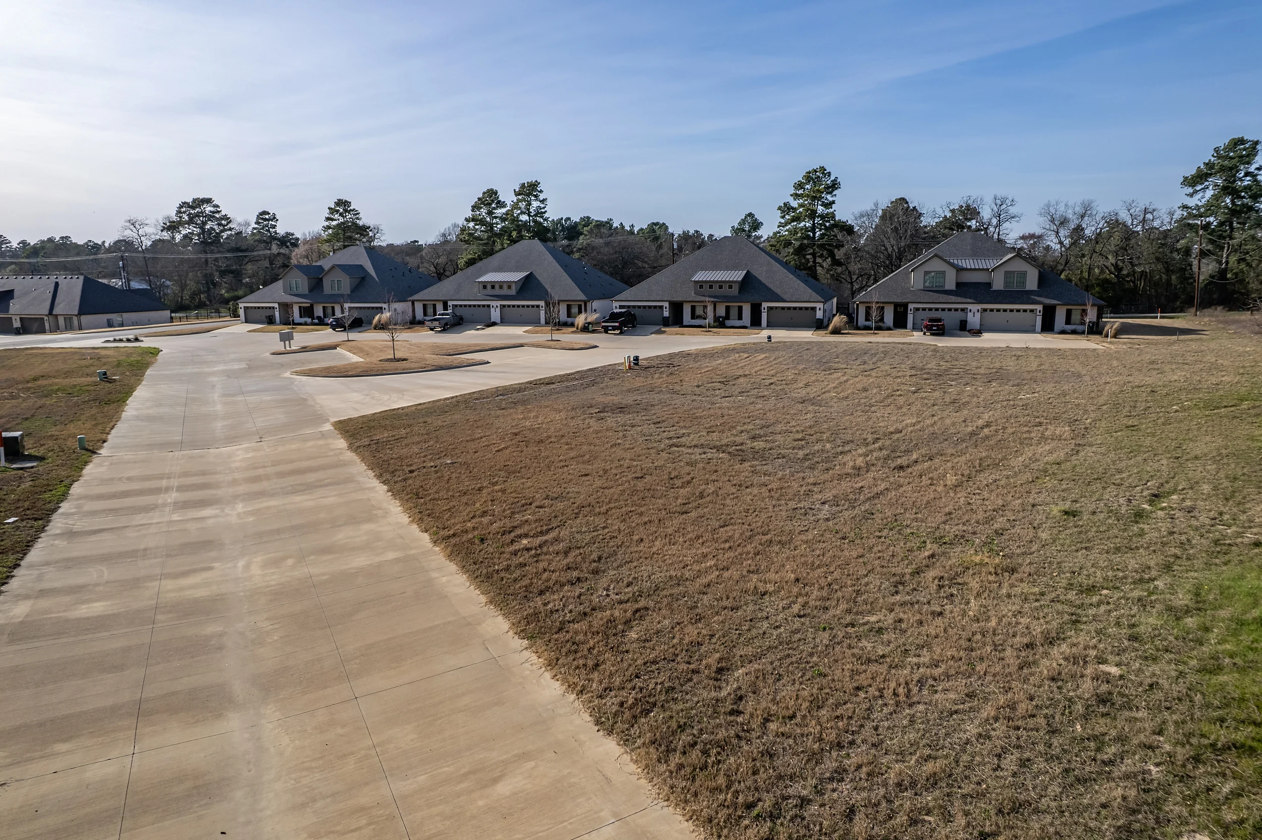 Aerial context view showing the seven lots and surrounding residential development in South Tyler.