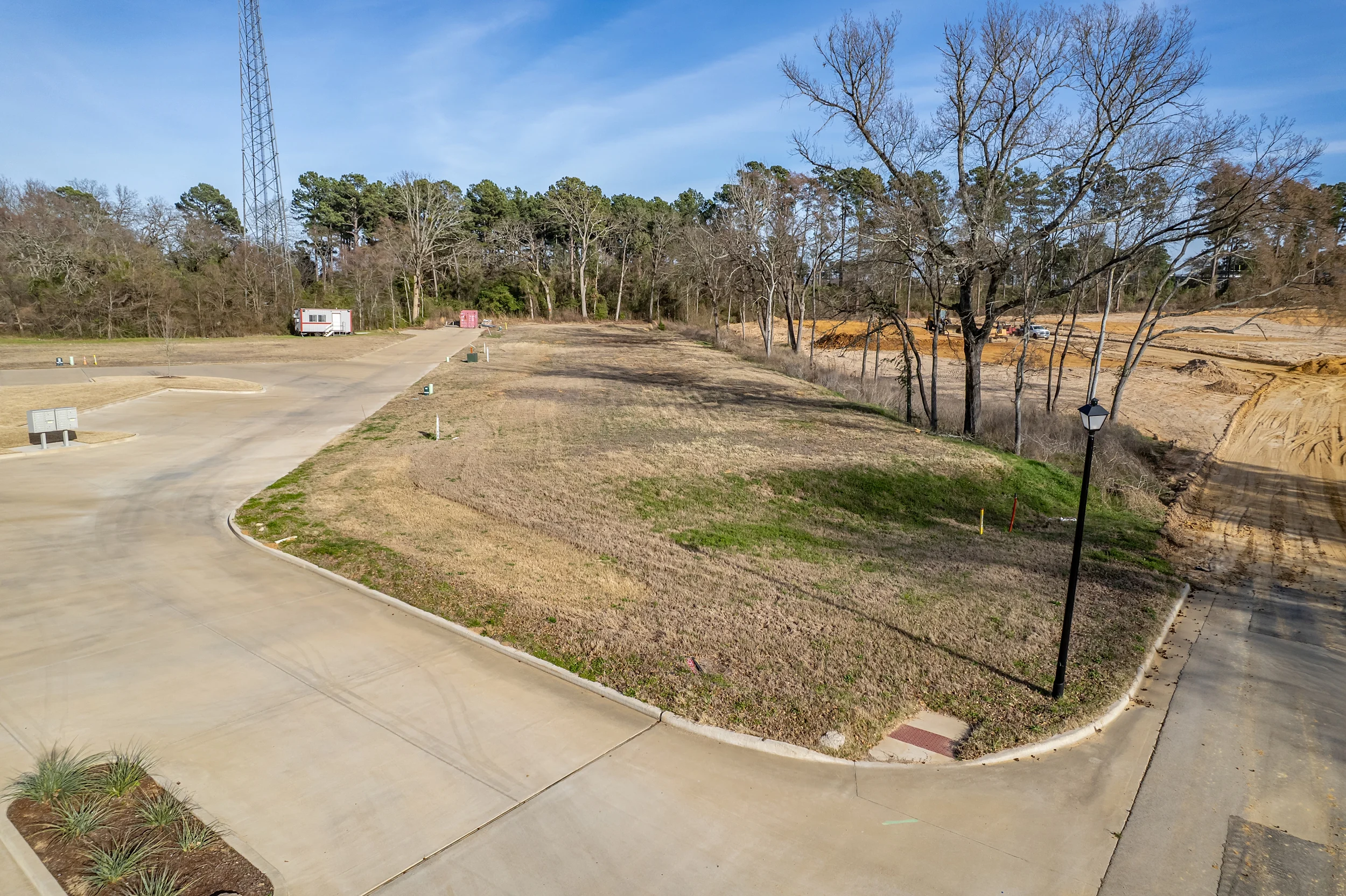 Aerial view along Lazy Vale Court showing access to the pad-ready duplex development parcels.