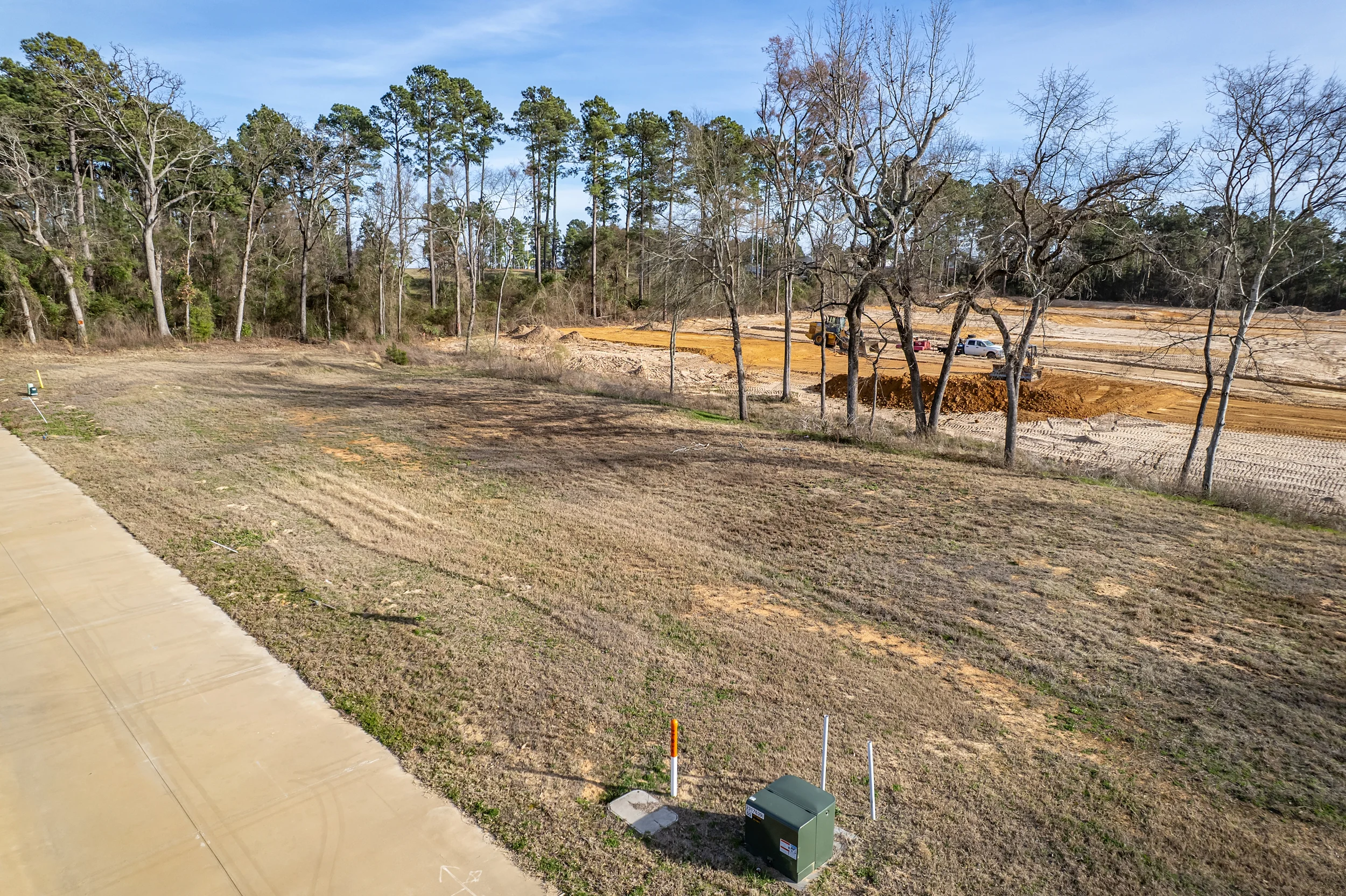 High aerial overview of the full seven-lot site and its South Tyler neighborhood context.