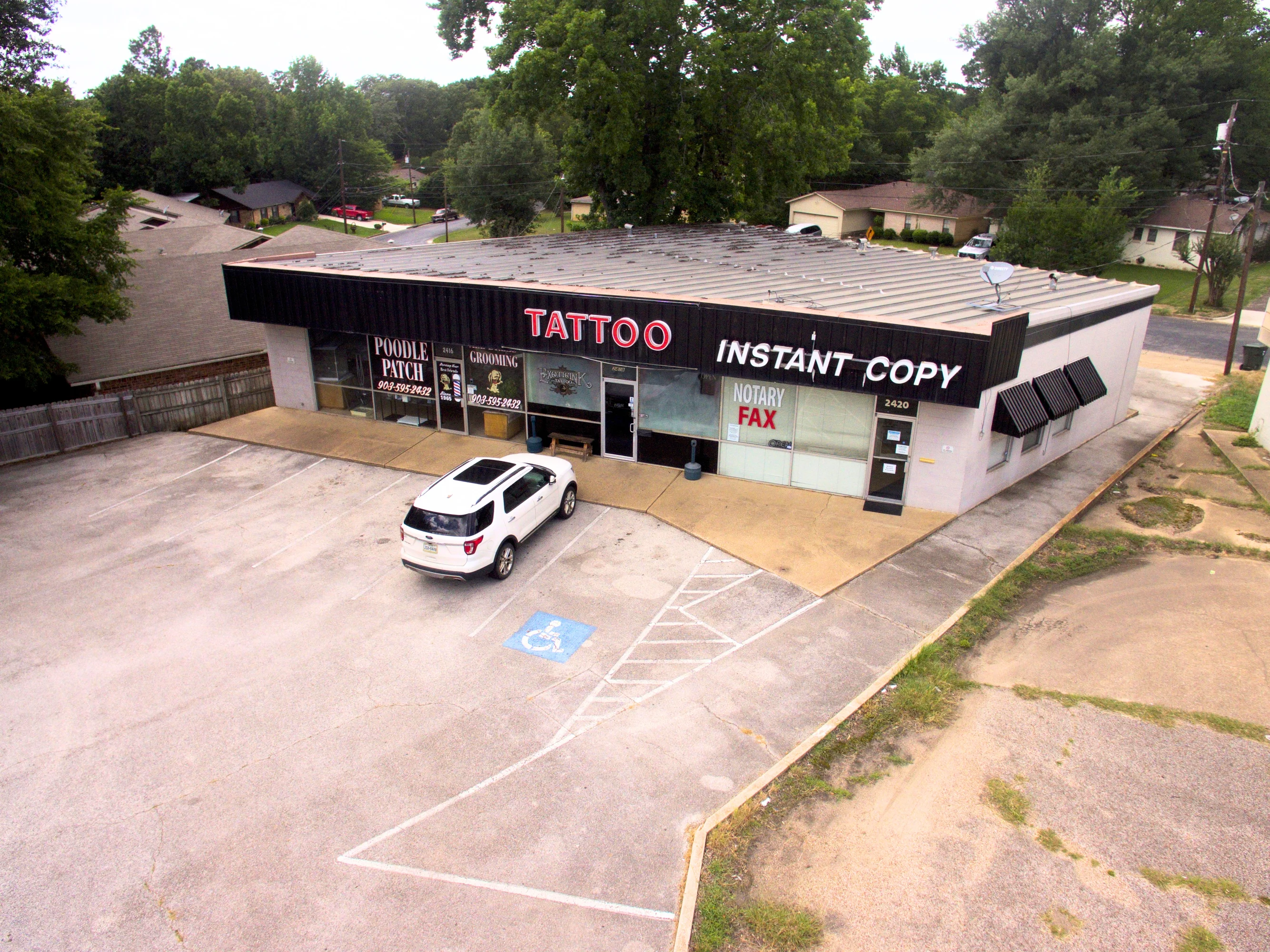 Side and rear exterior of the 2,800-square-foot multi-tenant retail building at 2416 E. Southeast Loop 323.