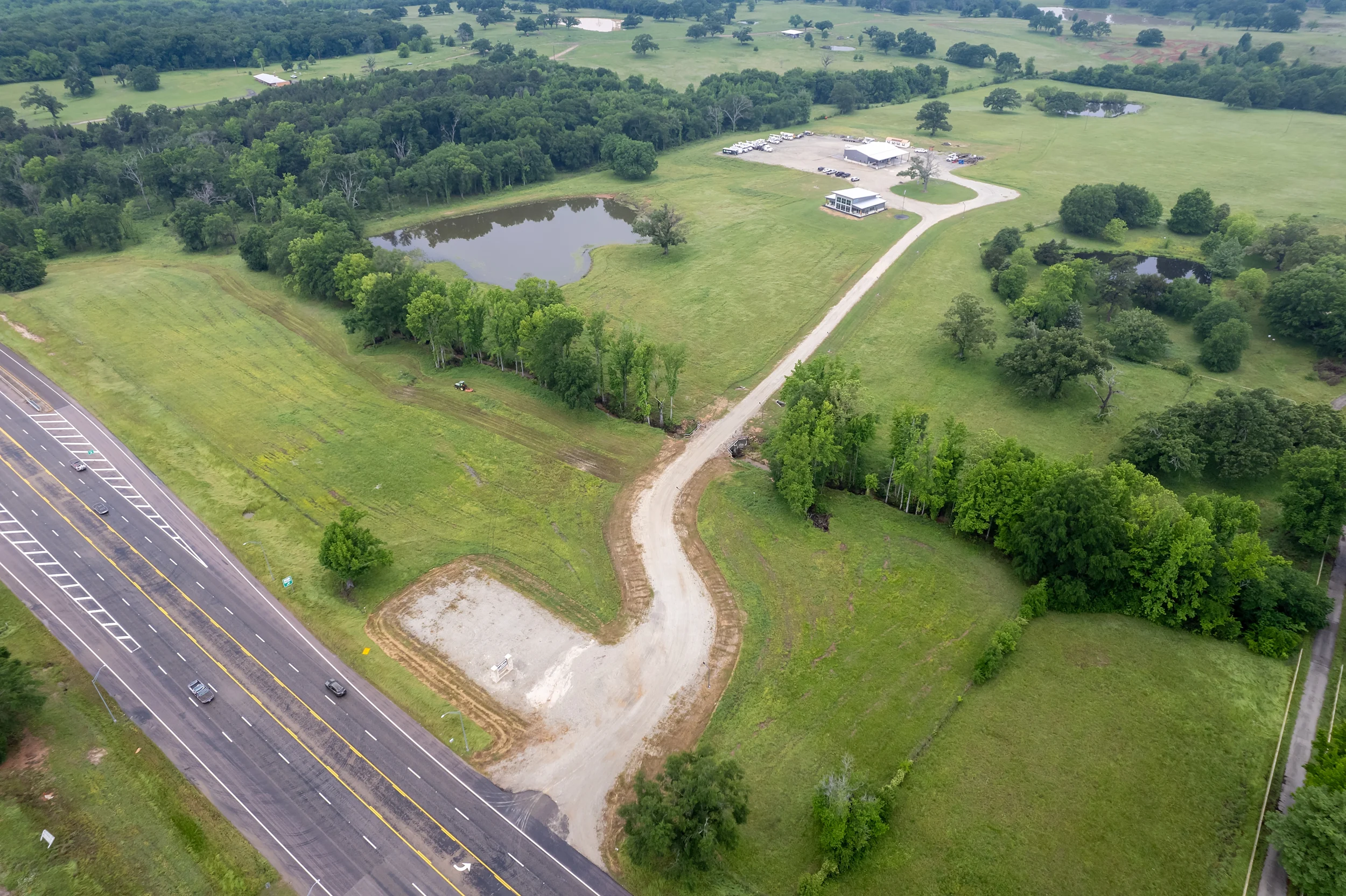 Aerial view of a smaller pad-site area within the available US-69 commercial development land.